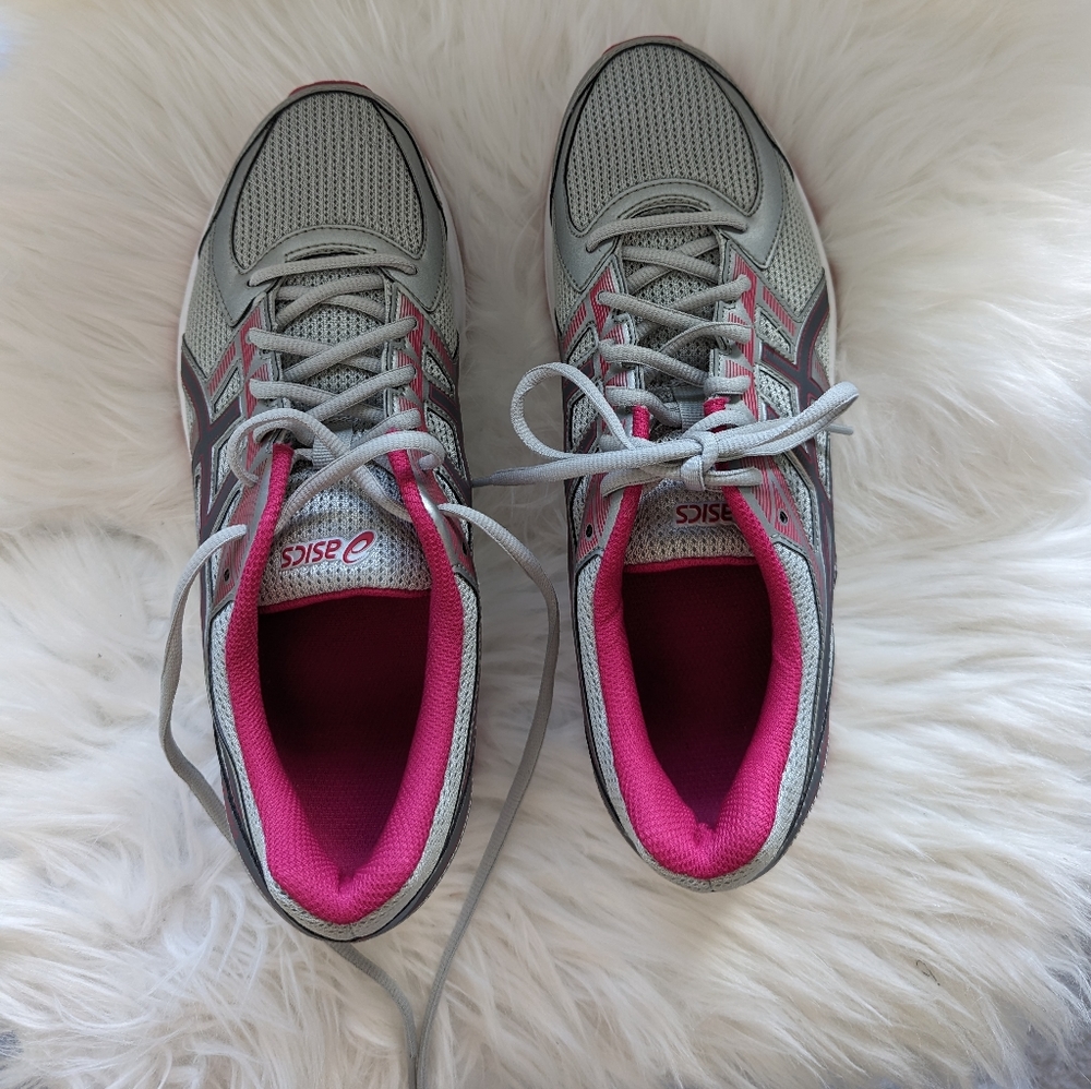 Never worn Asics sneakers.